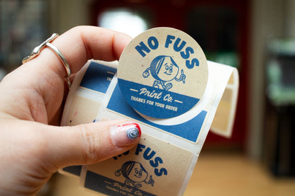 PAPER LABELS ON A ROLL